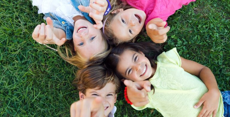 Group of childrens having fun in the park.